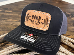 Feed and Seed Black Leather Patch Trucker Hat